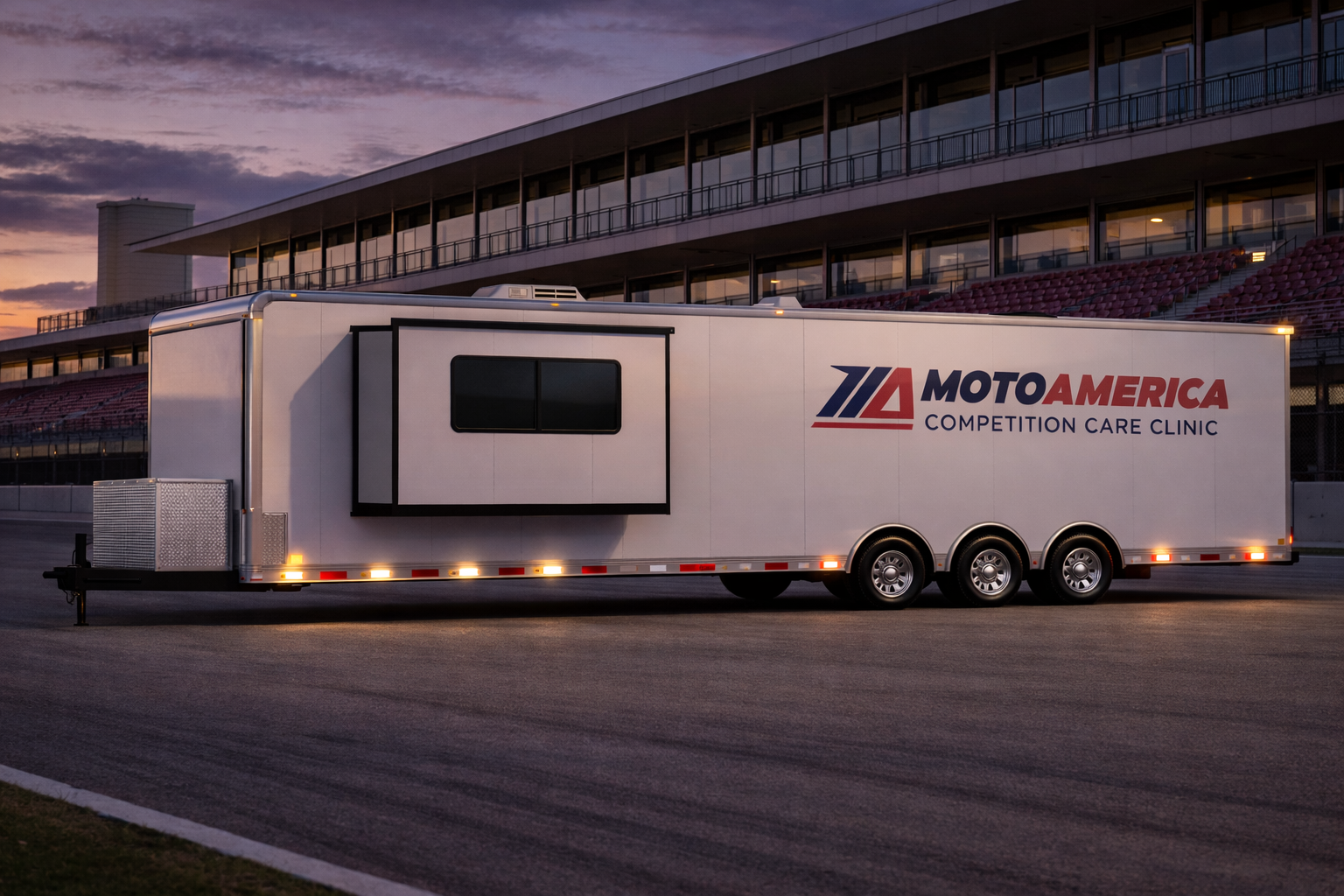 CCMF mobile medical trailer exterior approach angle at dusk